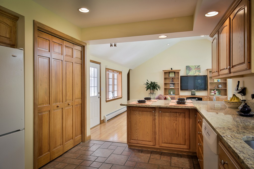 49 Porter Road Andover, MA 01810 - Photo 13 of 24 a kitchen with a sink and cabinets