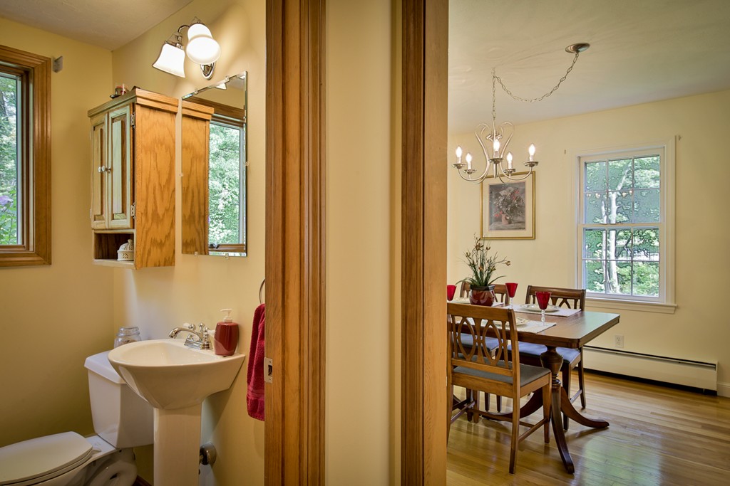 49 Porter Road Andover, MA 01810 - Photo 14 of 24 a bathroom with a sink mirror and a toilet
