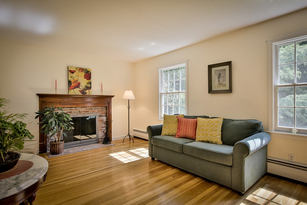 49 Porter Road Andover, MA 01810 - Photo 16 of 24 a living room with furniture and a fireplace