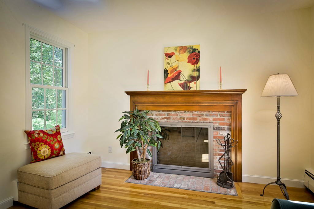 49 Porter Road Andover, MA 01810 - Photo 17 of 24 a living room with furniture and a fireplace