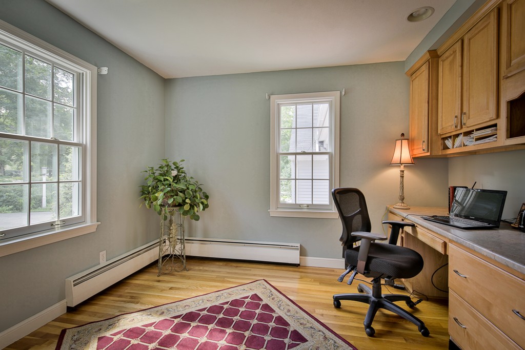 49 Porter Road Andover, MA 01810 - Photo 18 of 24 a view of a workspace with furniture and a window