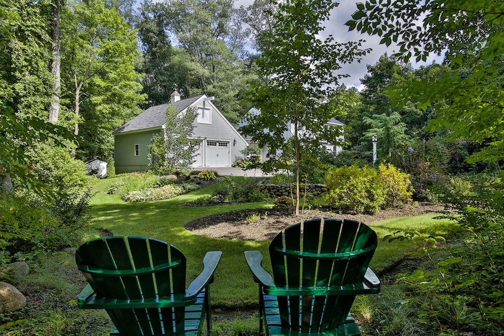 49 Porter Road Andover, MA 01810 - Photo 2 of 24 a view of a chairs and table in the patio