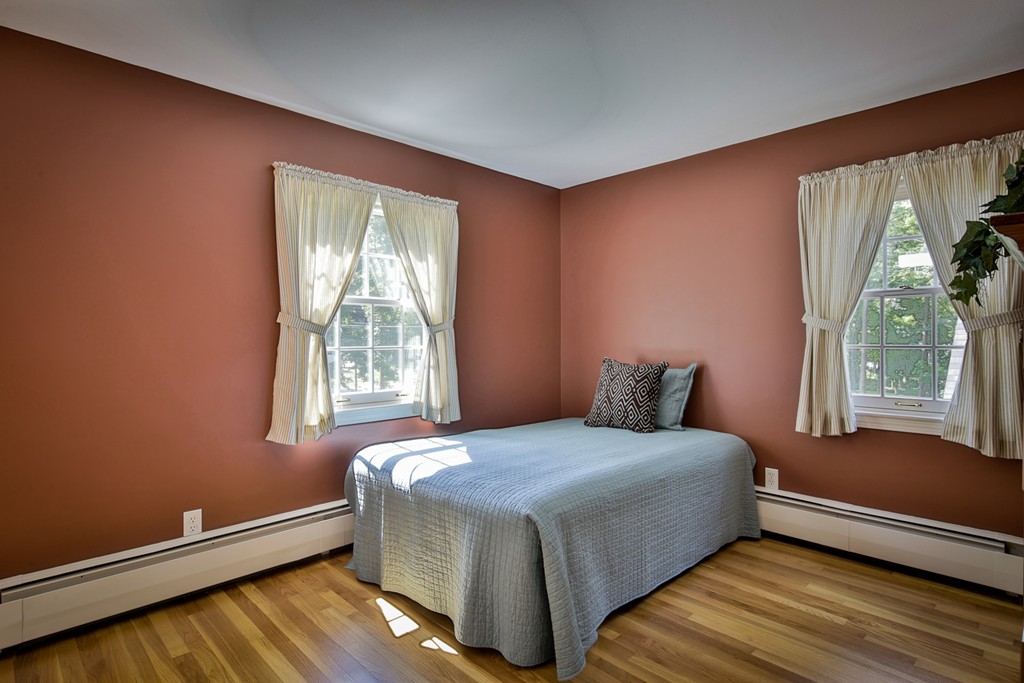 49 Porter Road Andover, MA 01810 - Photo 24 of 24 a bedroom with a bed and window