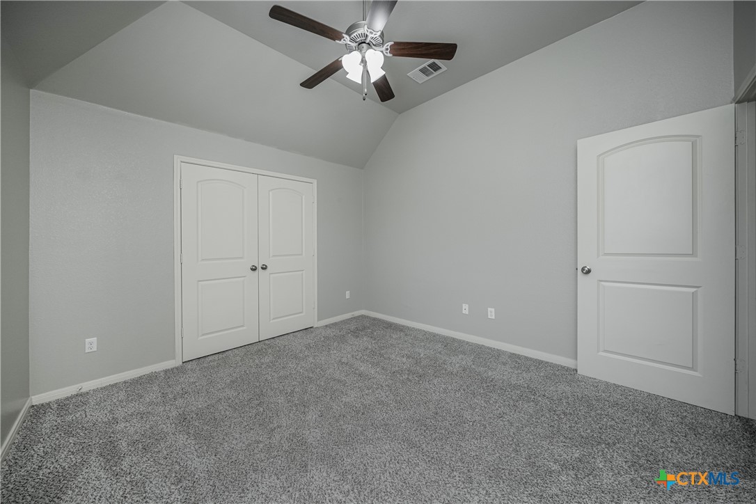 7848 Old Gate Road Temple, TX 76502 - Photo 27 of 32 a view of an empty room and a ceiling fan