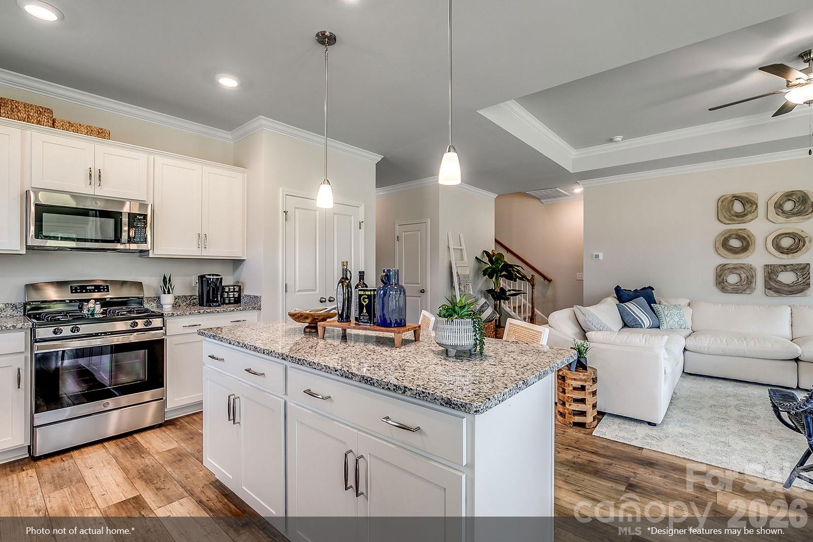 206 Rodeo Drive, Unit 25 Shelby, NC 28150 - Photo 3 of 9 a kitchen with a sink stove and microwave