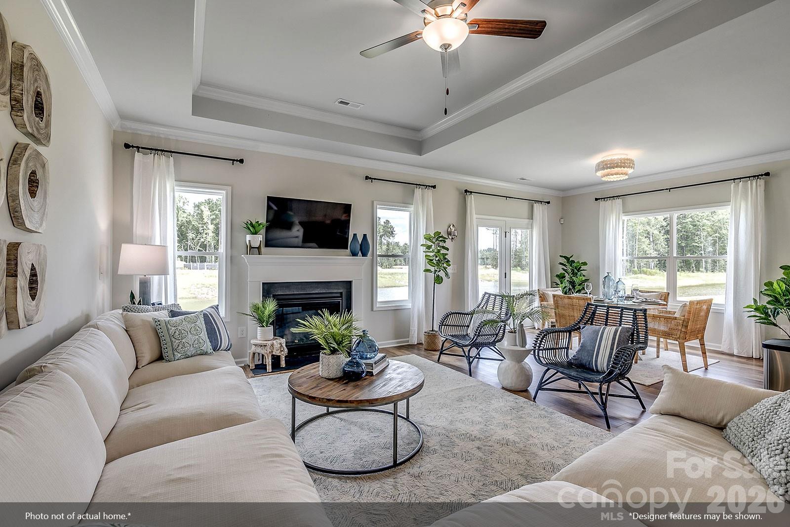 206 Rodeo Drive, Unit 25 Shelby, NC 28150 - Photo 5 of 9 a living room with furniture a fireplace and a large window