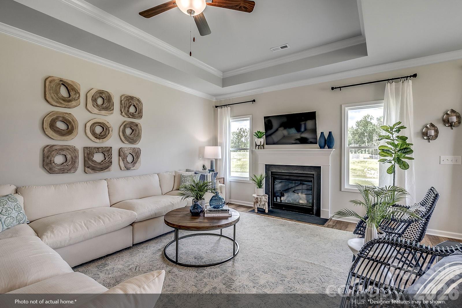 206 Rodeo Drive, Unit 25 Shelby, NC 28150 - Photo 7 of 9 a living room with furniture and a fireplace