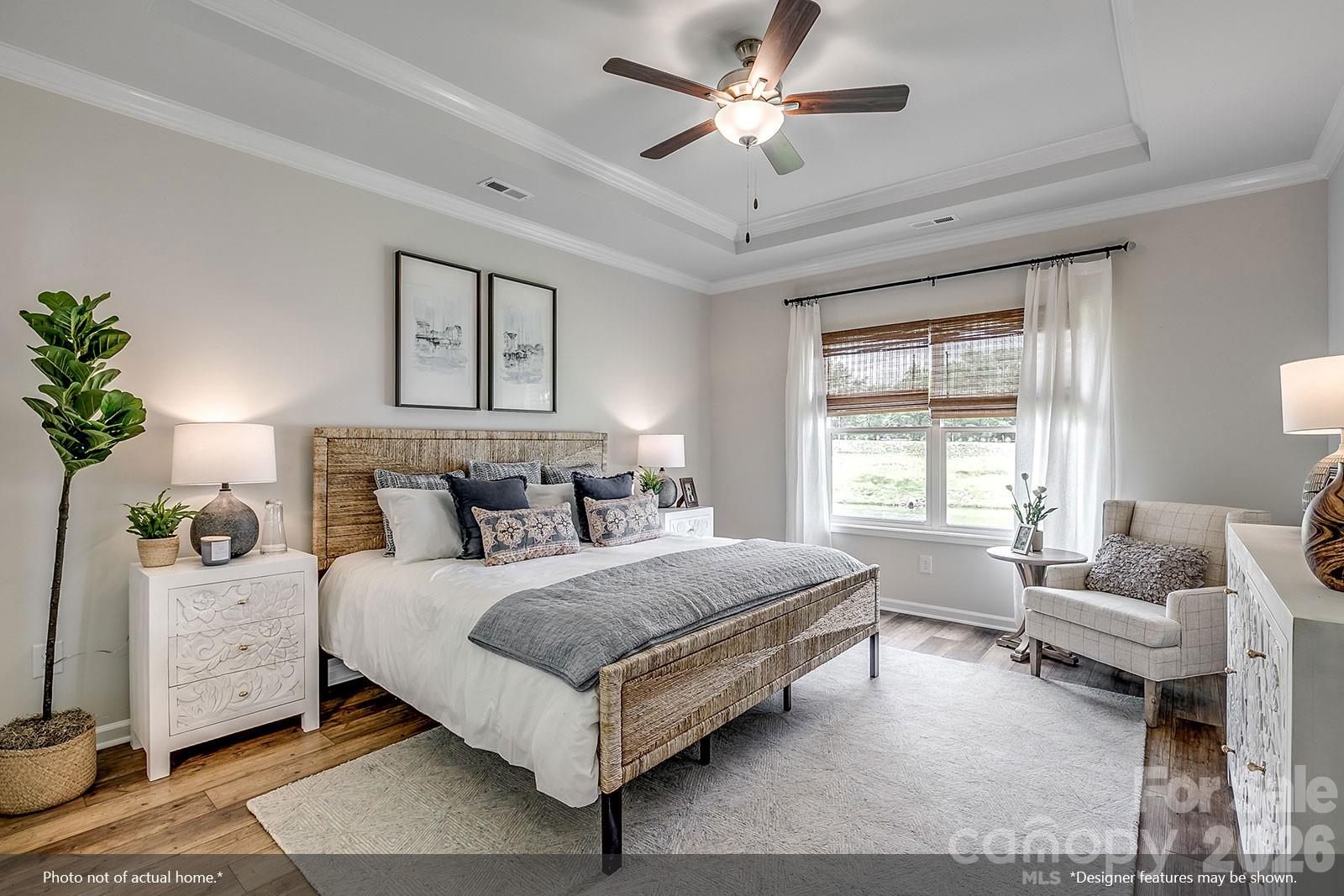 206 Rodeo Drive, Unit 25 Shelby, NC 28150 - Photo 8 of 9 a bedroom with a bed couch and windows