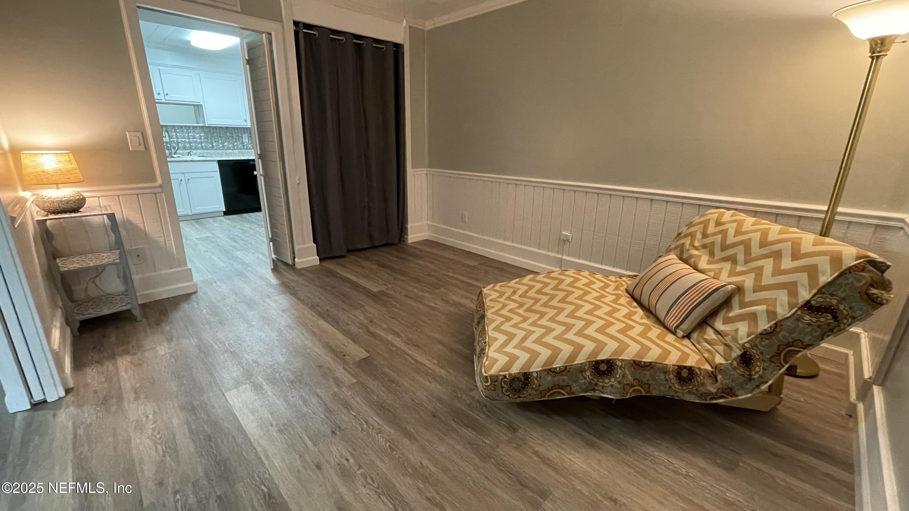 2510 Southwest 14th Drive Gainesville, FL 32608 - Photo 27 of 71 a bedroom with a bed and a couch