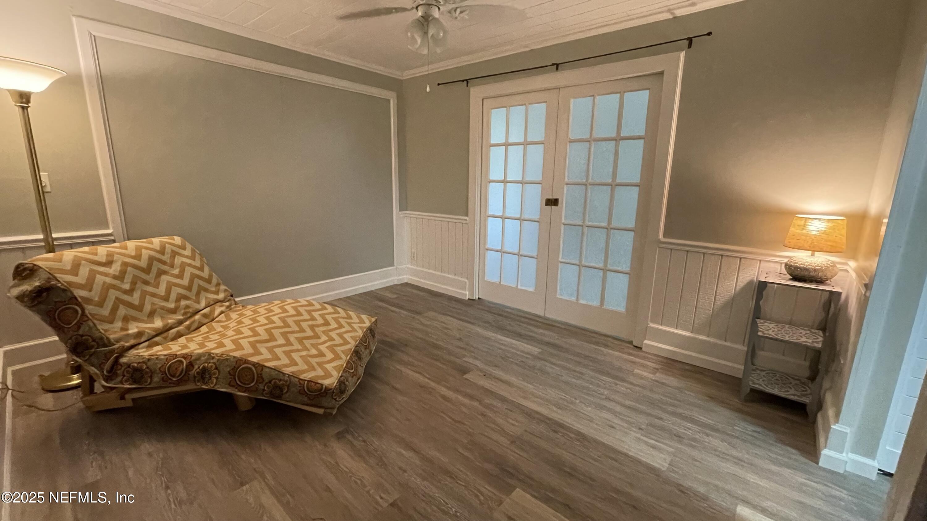 2510 Southwest 14th Drive Gainesville, FL 32608 - Photo 31 of 71 a bedroom with a bed and a window