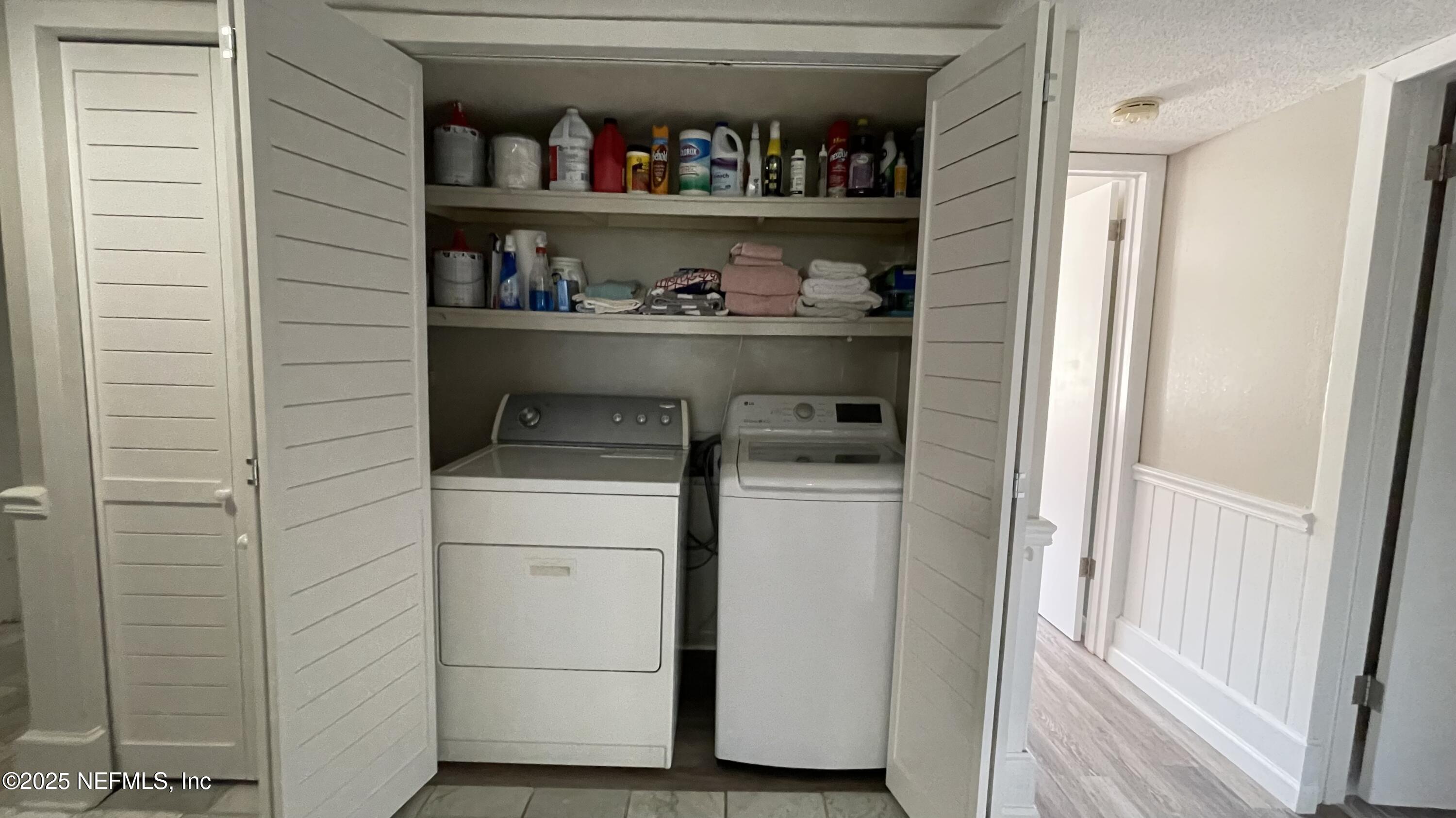 2510 Southwest 14th Drive Gainesville, FL 32608 - Photo 55 of 71 a utility room with washer and dryer