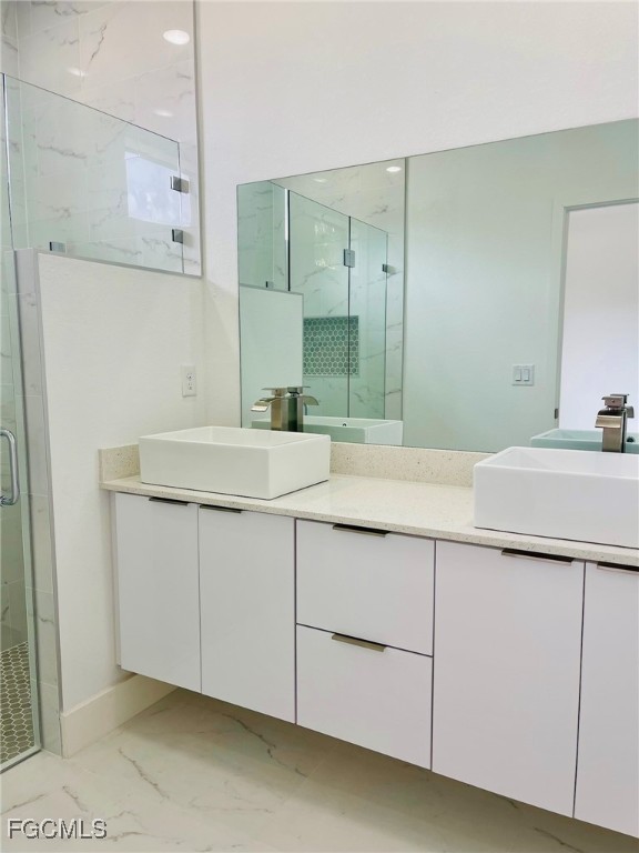 2016 Hercules Road LaBelle, FL 33935 - Photo 11 of 13 a bathroom with a sink and a mirror