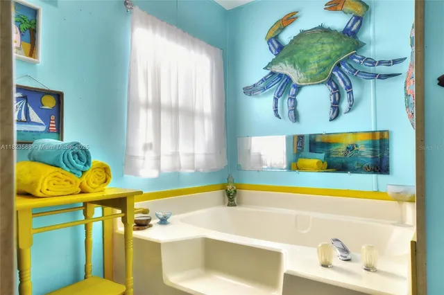 a bathroom with a sink and a bathtub