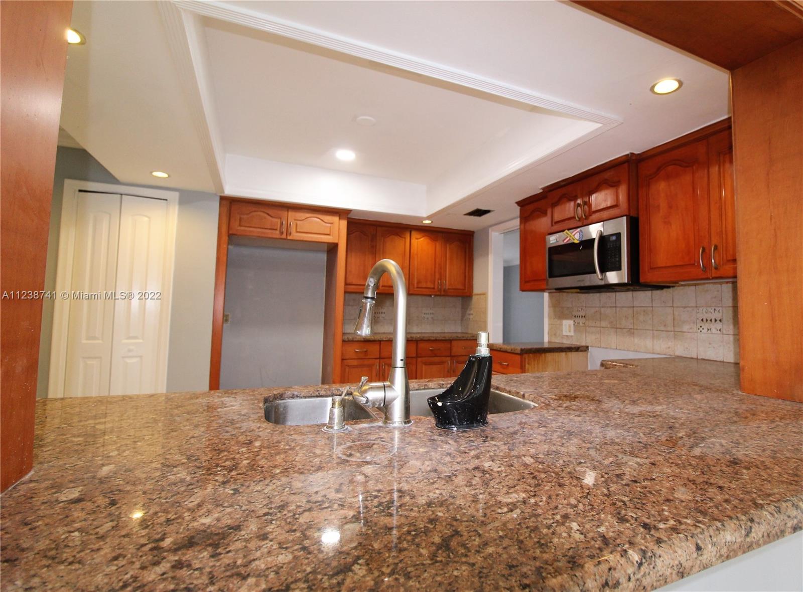 5261 Southwest 9th Street Plantation, FL 33317 - Photo 12 of 27 a view of a room with a gym equipment