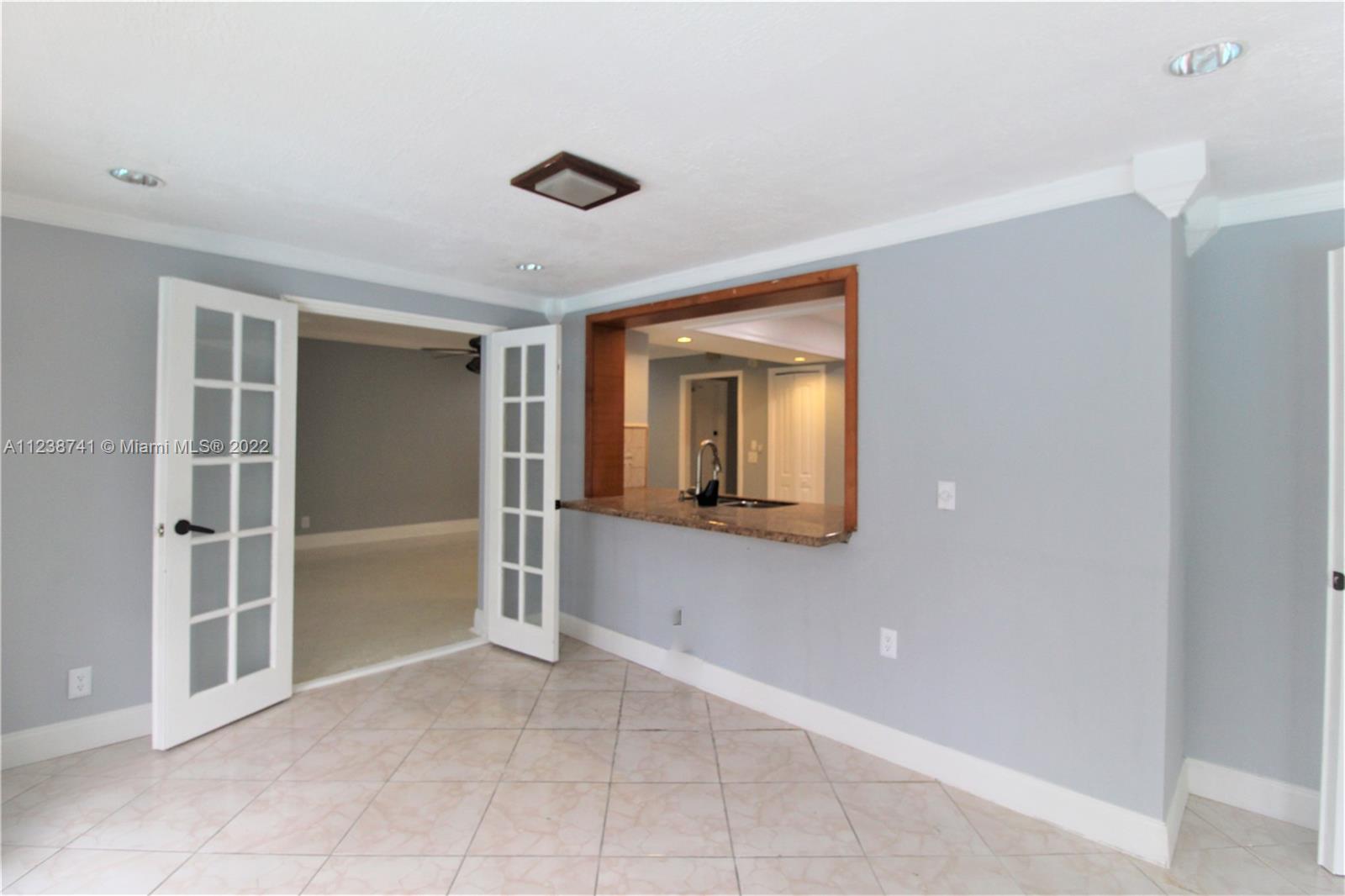 5261 Southwest 9th Street Plantation, FL 33317 - Photo 13 of 27 a view of an empty room