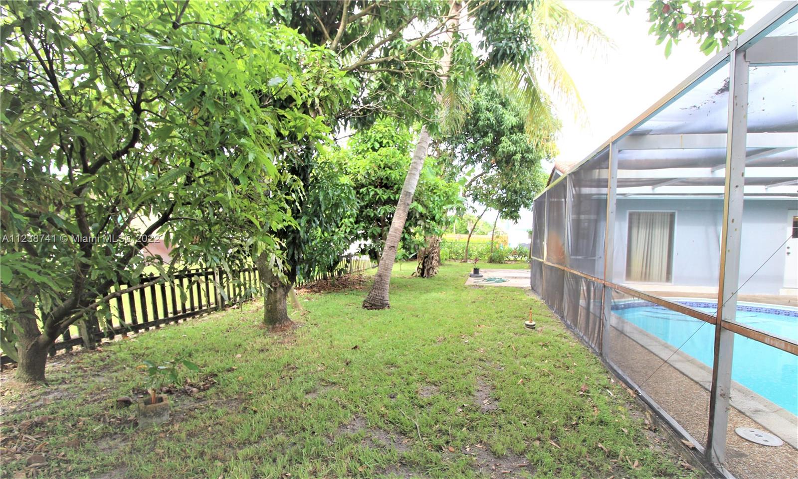 5261 Southwest 9th Street Plantation, FL 33317 - Photo 17 of 27 a view of yard from a balcony