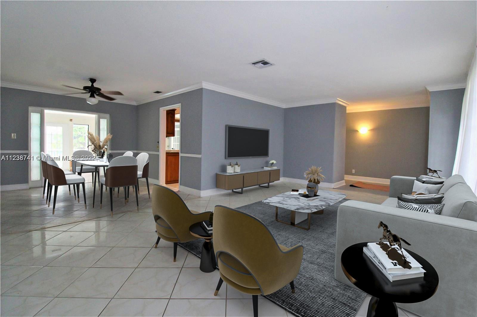 5261 Southwest 9th Street Plantation, FL 33317 - Photo 2 of 27 a view of a dining room with furniture