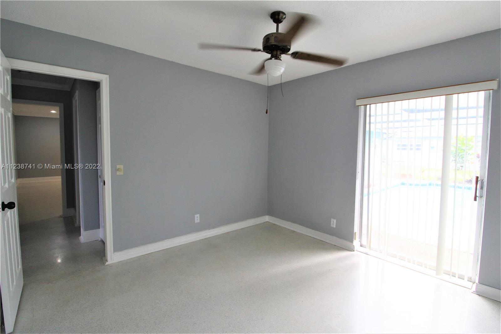 5261 Southwest 9th Street Plantation, FL 33317 - Photo 22 of 27 a view of a livingroom with a window