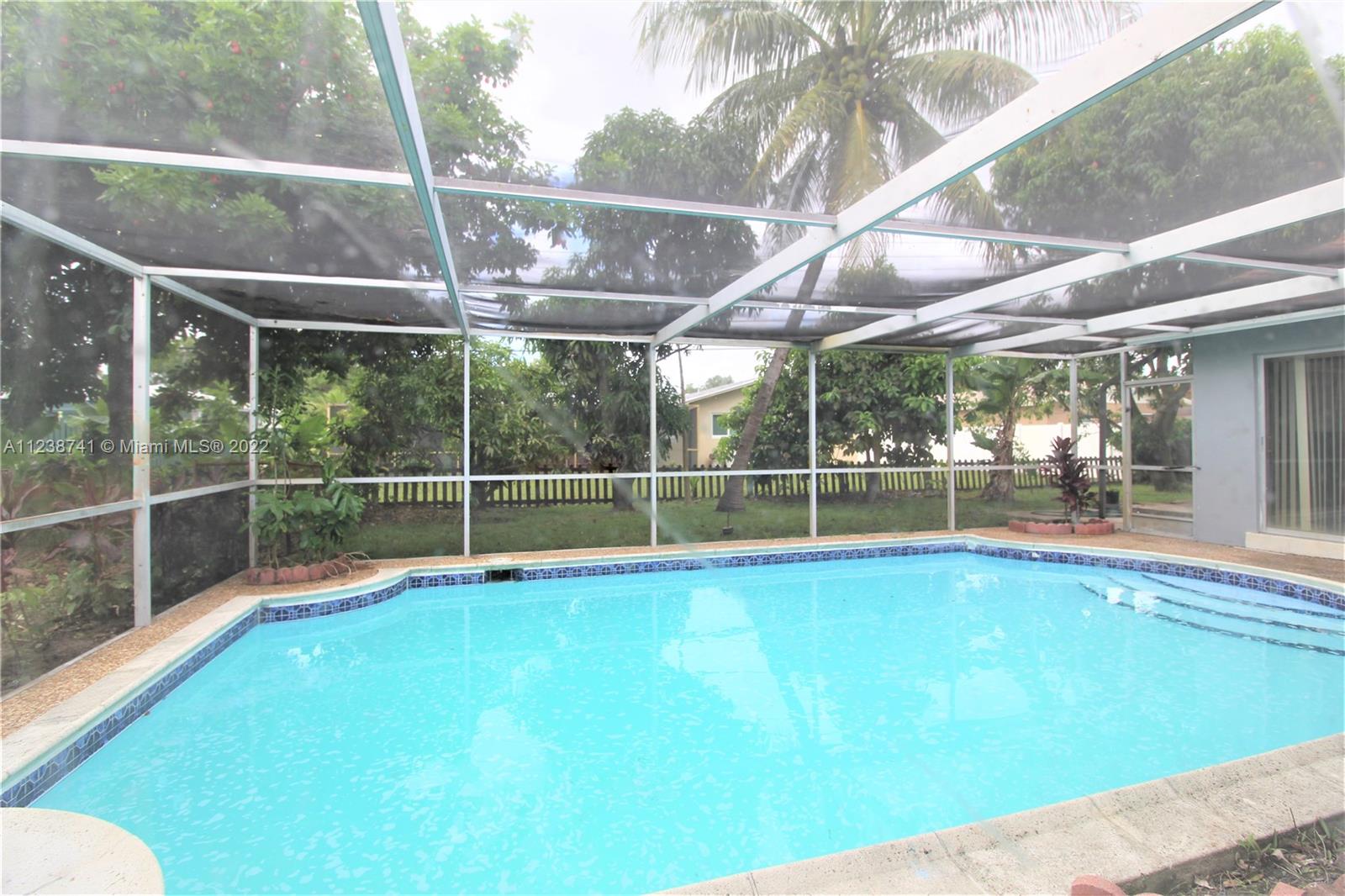 5261 Southwest 9th Street Plantation, FL 33317 - Photo 5 of 27 a view of a backyard