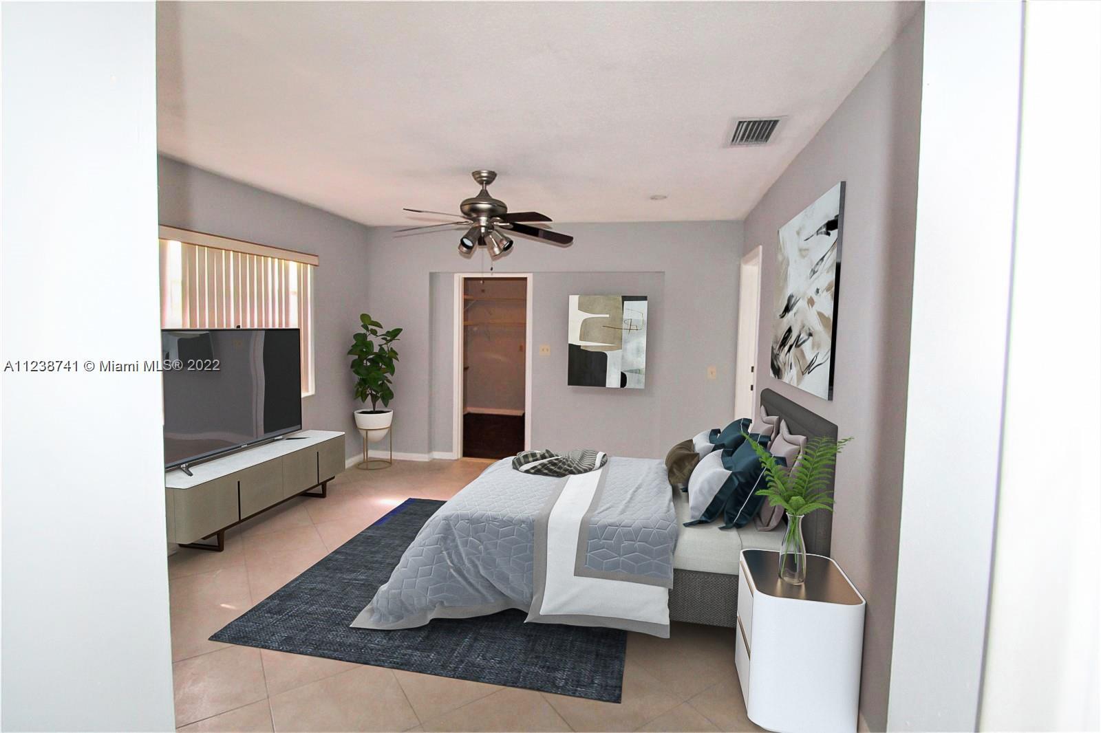 5261 Southwest 9th Street Plantation, FL 33317 - Photo 6 of 27 a living room with furniture and a flat screen tv