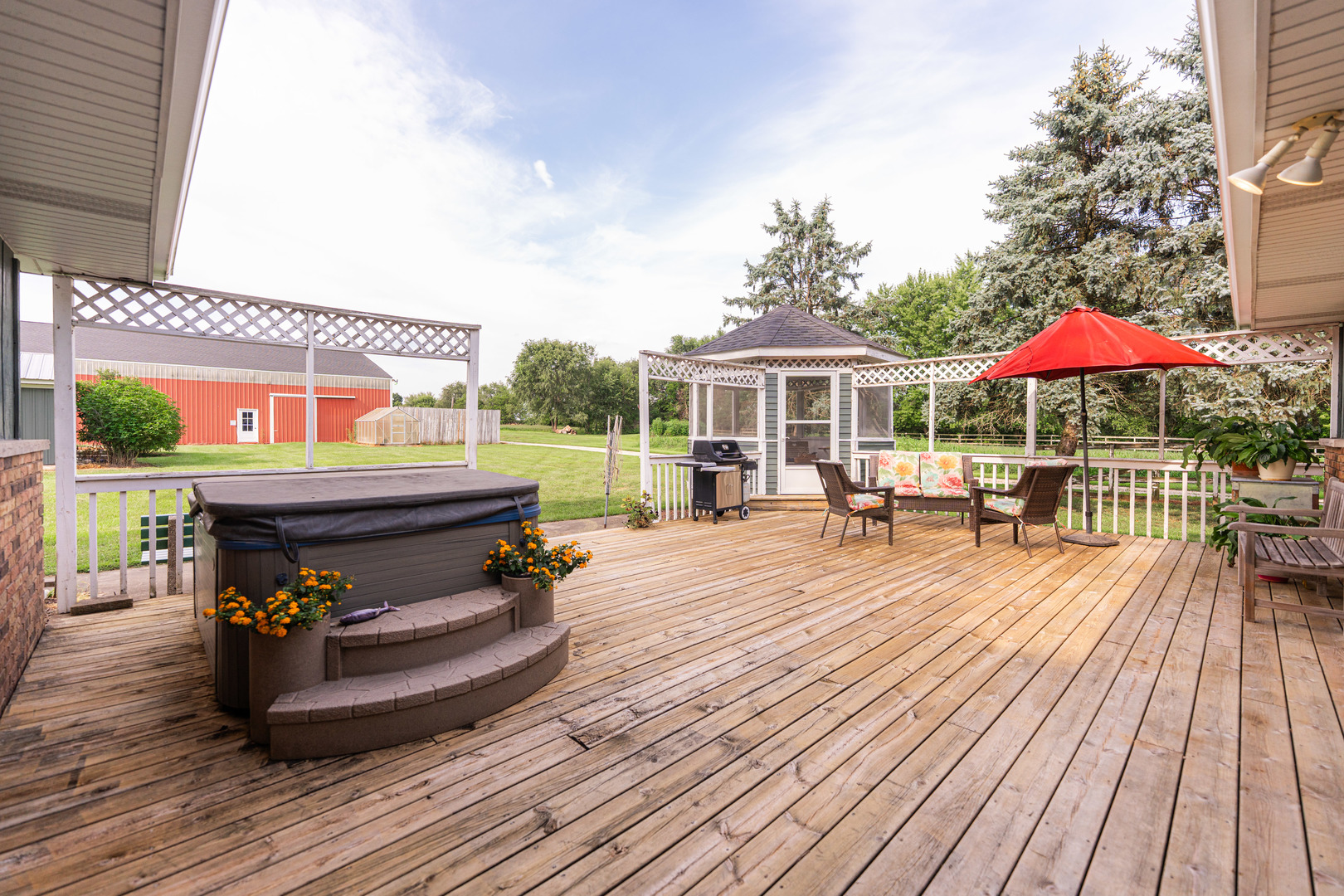 17751 Scott Road Hinckley, IL 60520 - Photo 35 of 72 a sitting area with furniture and wooden floor