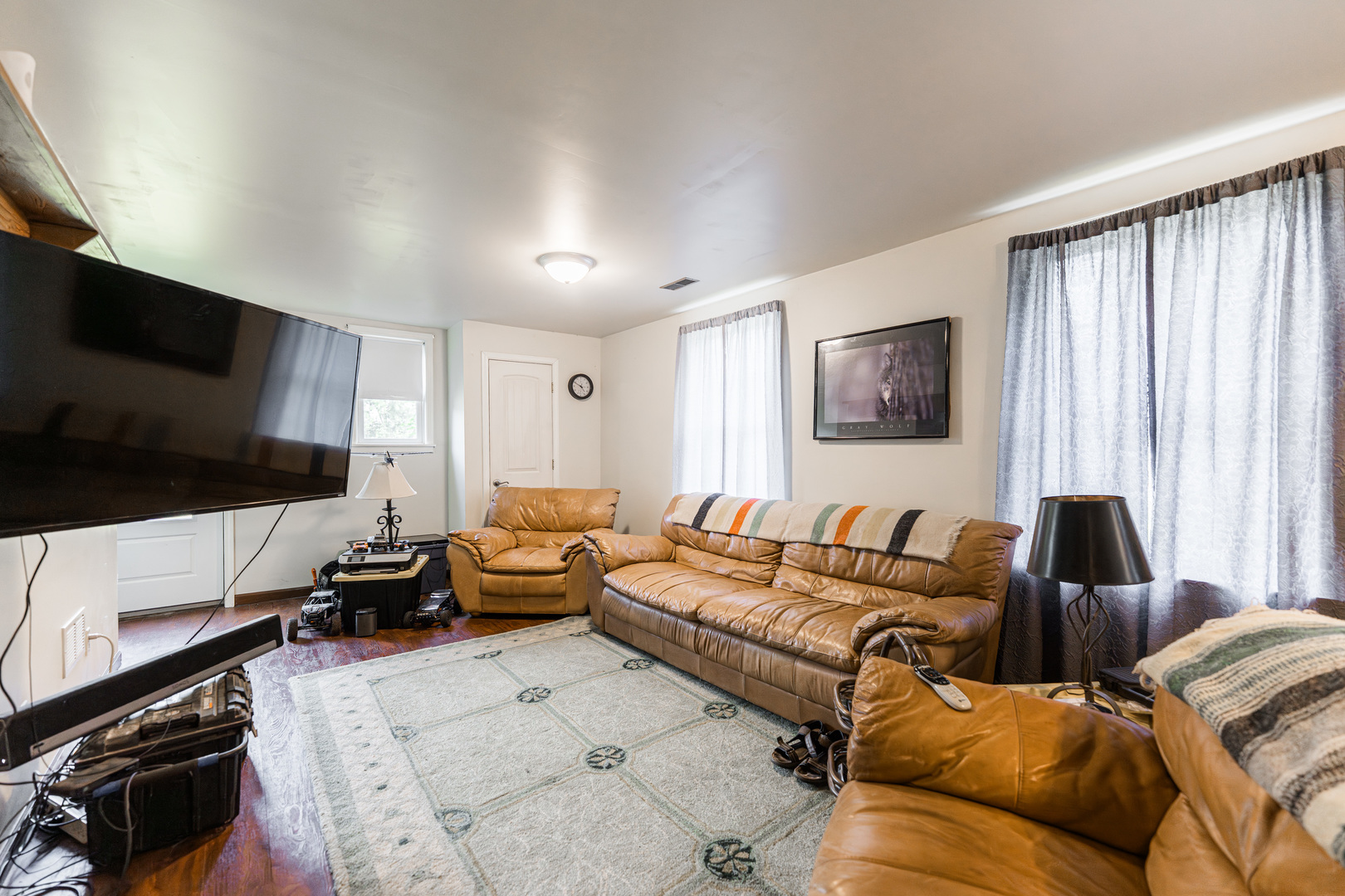 17751 Scott Road Hinckley, IL 60520 - Photo 49 of 72 a living room with furniture and a flat screen tv