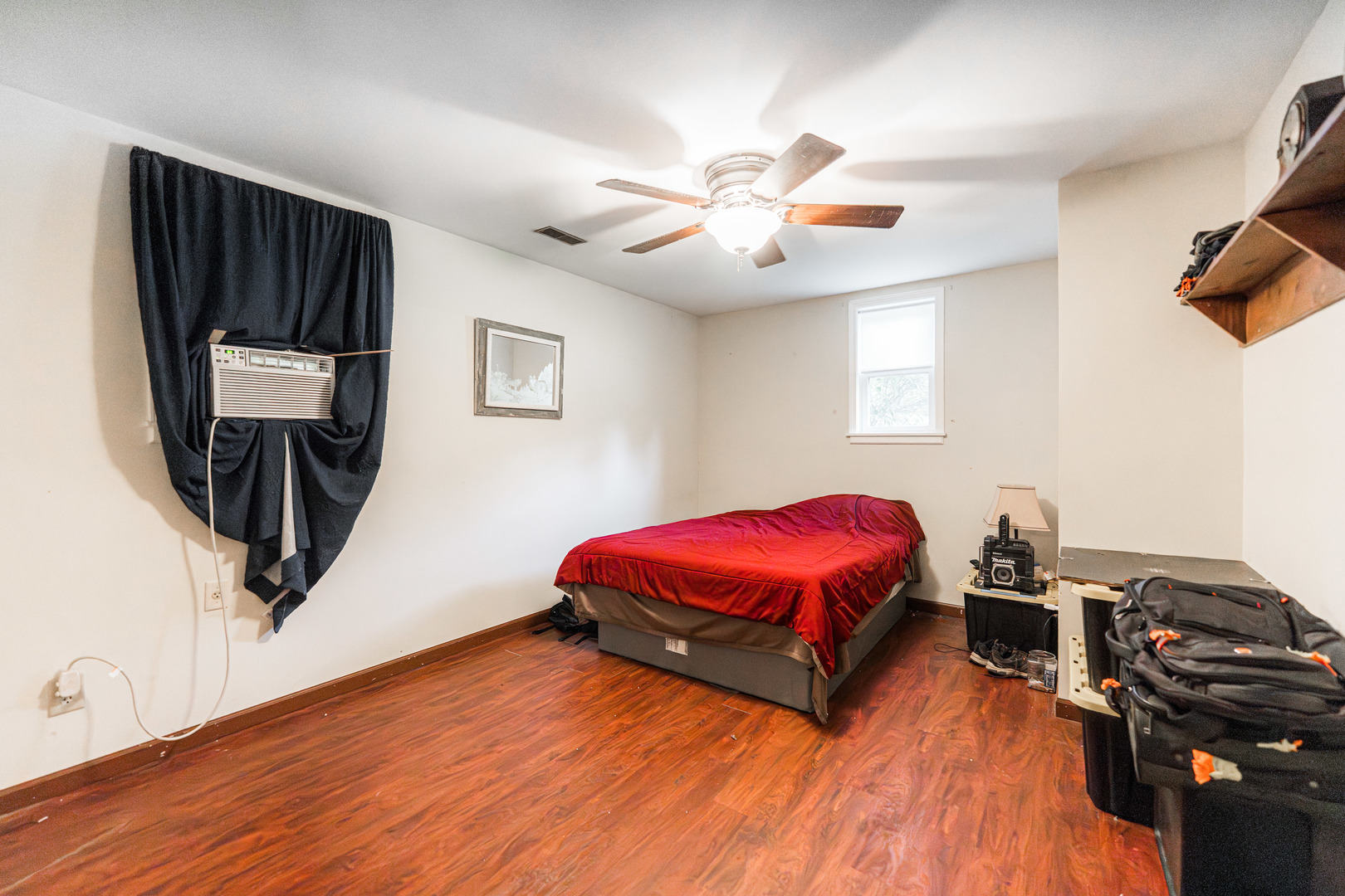 17751 Scott Road Hinckley, IL 60520 - Photo 51 of 72 a bedroom with a bed and wooden floor