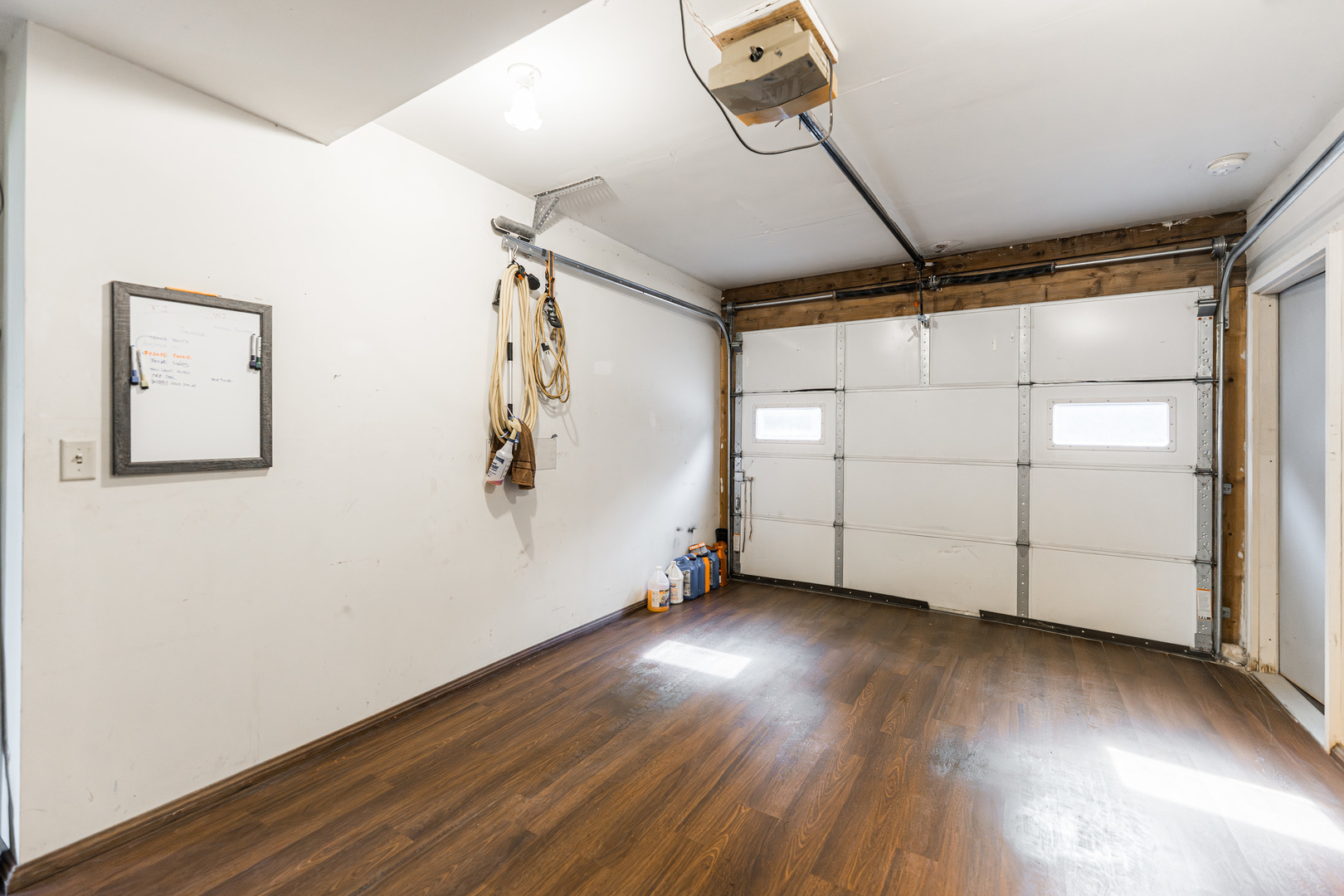 17751 Scott Road Hinckley, IL 60520 - Photo 55 of 72 an empty room with wooden floor and windows