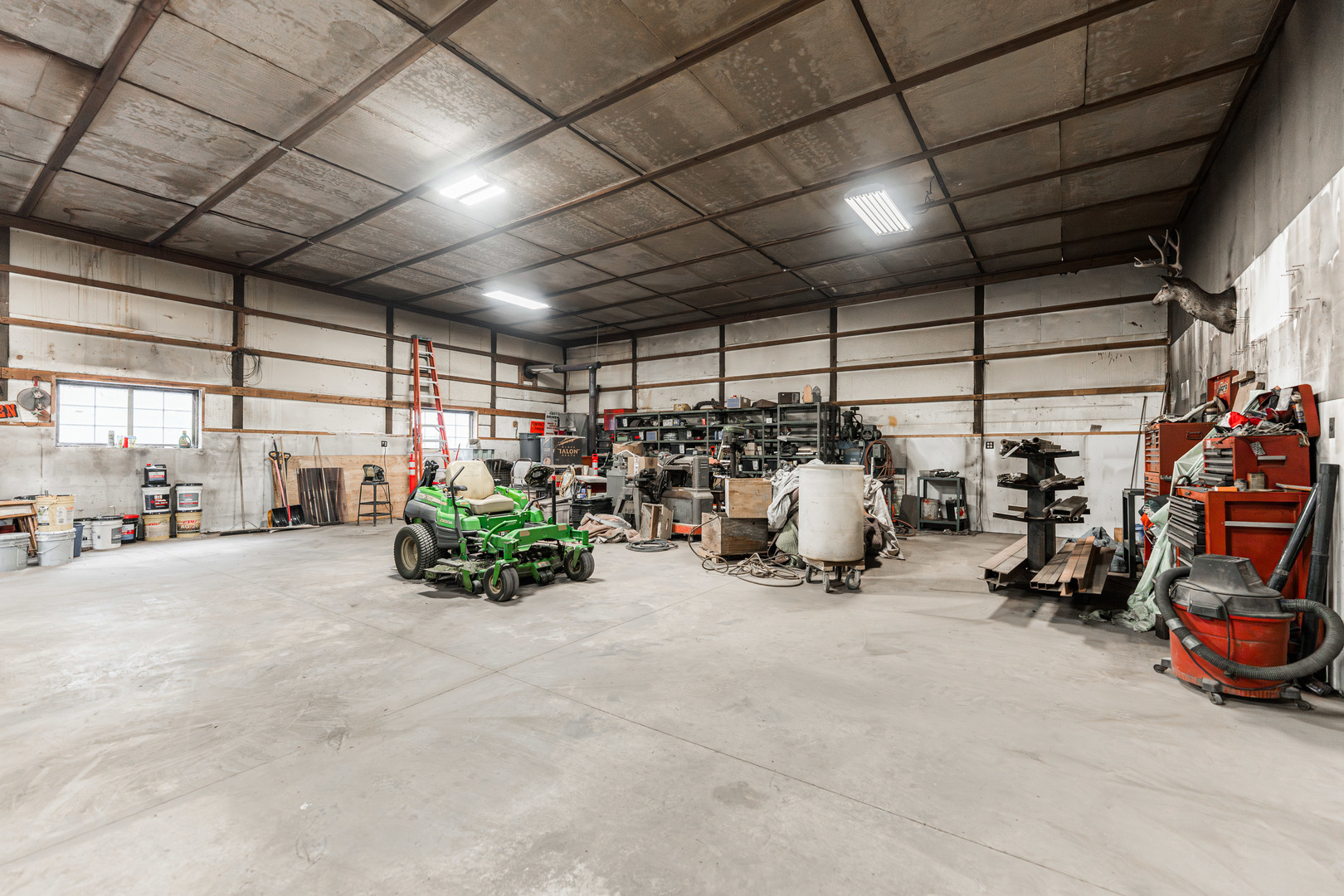 17751 Scott Road Hinckley, IL 60520 - Photo 58 of 72 a view of a garage with parked cars