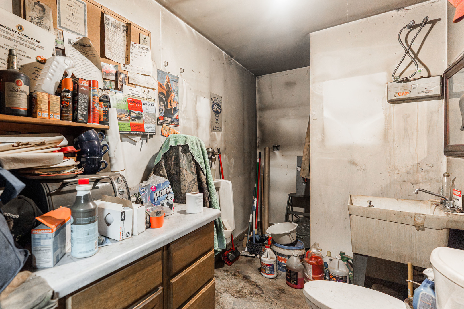 17751 Scott Road Hinckley, IL 60520 - Photo 62 of 72 a bathroom with a sink a toilet and shower curtain