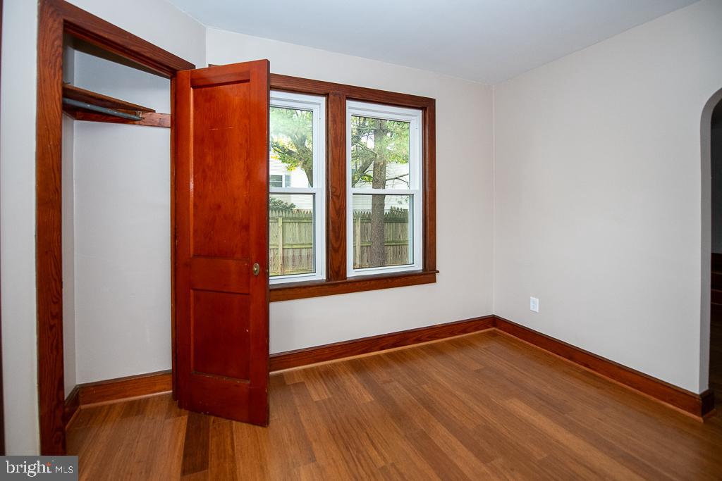 9 Fulton Avenue Walkersville, MD 21793 - Photo 12 of 28 a view of an empty room with wooden floor and a window
