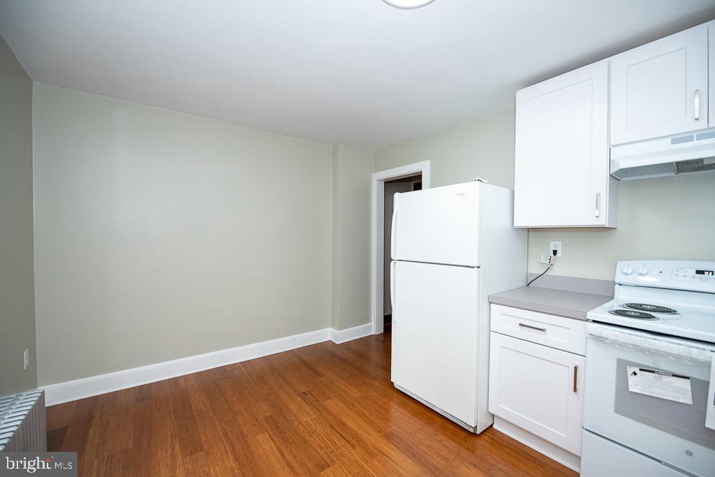 9 Fulton Avenue Walkersville, MD 21793 - Photo 16 of 28 a white refrigerator freezer sitting in a kitchen