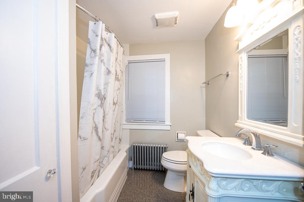 9 Fulton Avenue Walkersville, MD 21793 - Photo 23 of 28 a bathroom with a sink toilet and shower