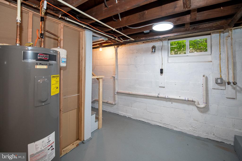 9 Fulton Avenue Walkersville, MD 21793 - Photo 27 of 28 a bathroom with a bathtub and a shower