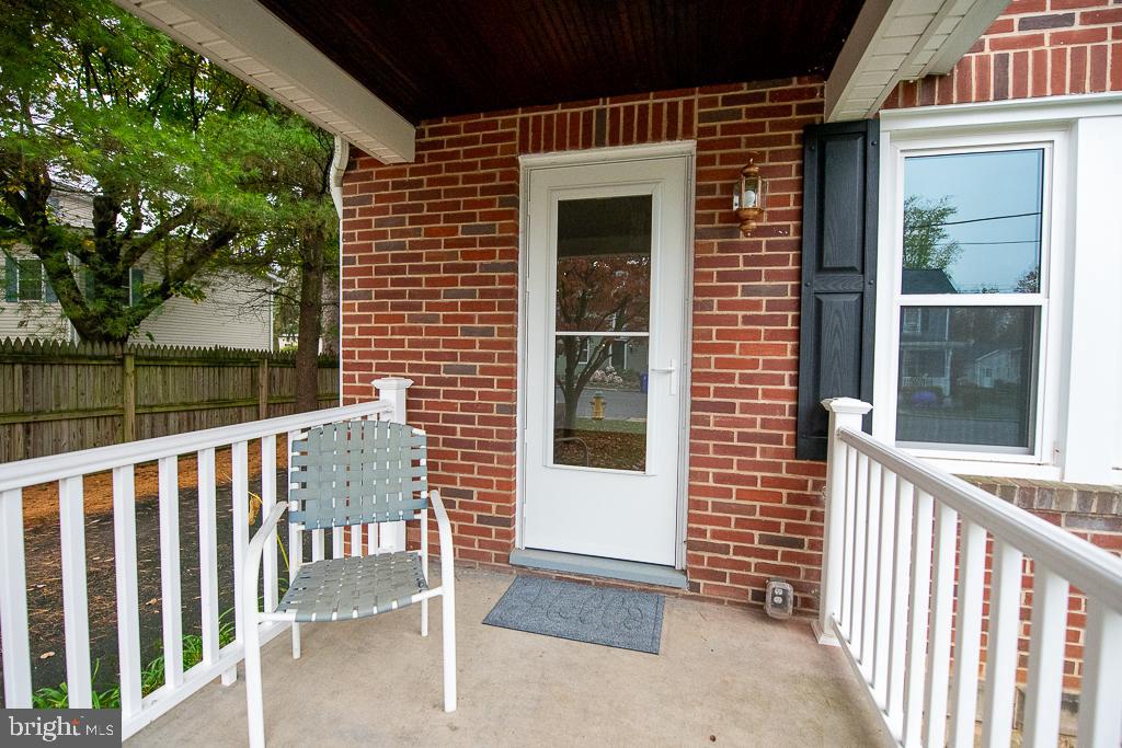 9 Fulton Avenue Walkersville, MD 21793 - Photo 3 of 28 a view of a porch with a small yard