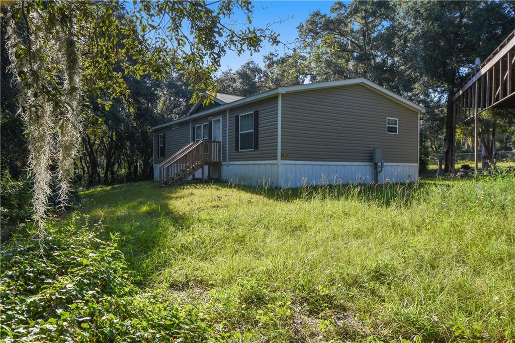 2010 Haas Road Apopka, FL 32712 - Photo 1 of 1 Spectacular outdoor spaces to savor the views and extensive landscaping await in this IMPRESSIVE 12.5 ACRE LOT!
