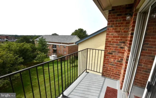 an aerial view of a city and mountain