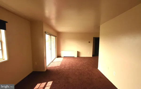 a view of a room with a windows