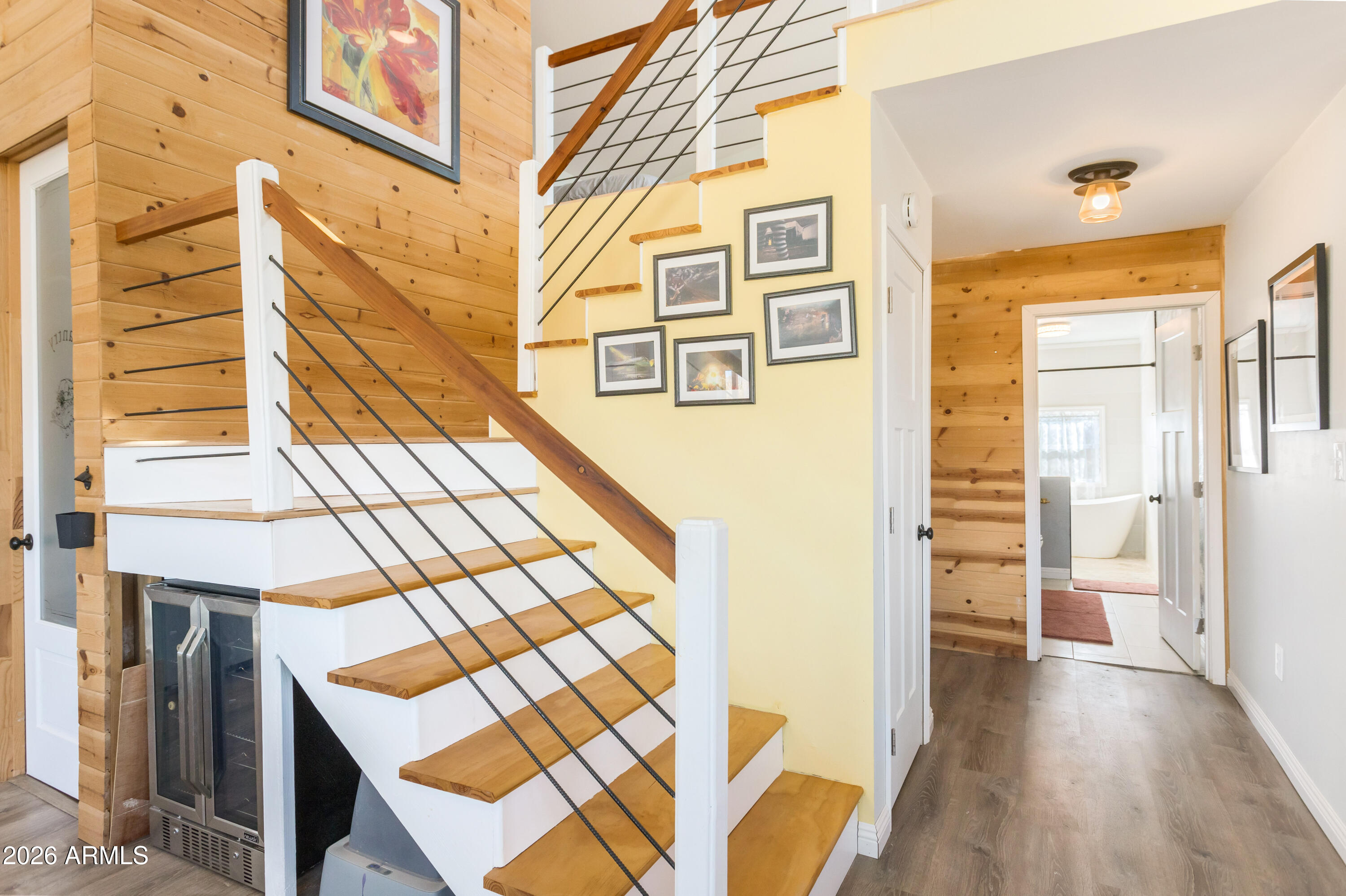 11441 South Samuel Road Hereford, AZ 85615 - Photo 38 of 47 a view of a balcony with wooden floor and a kitchen