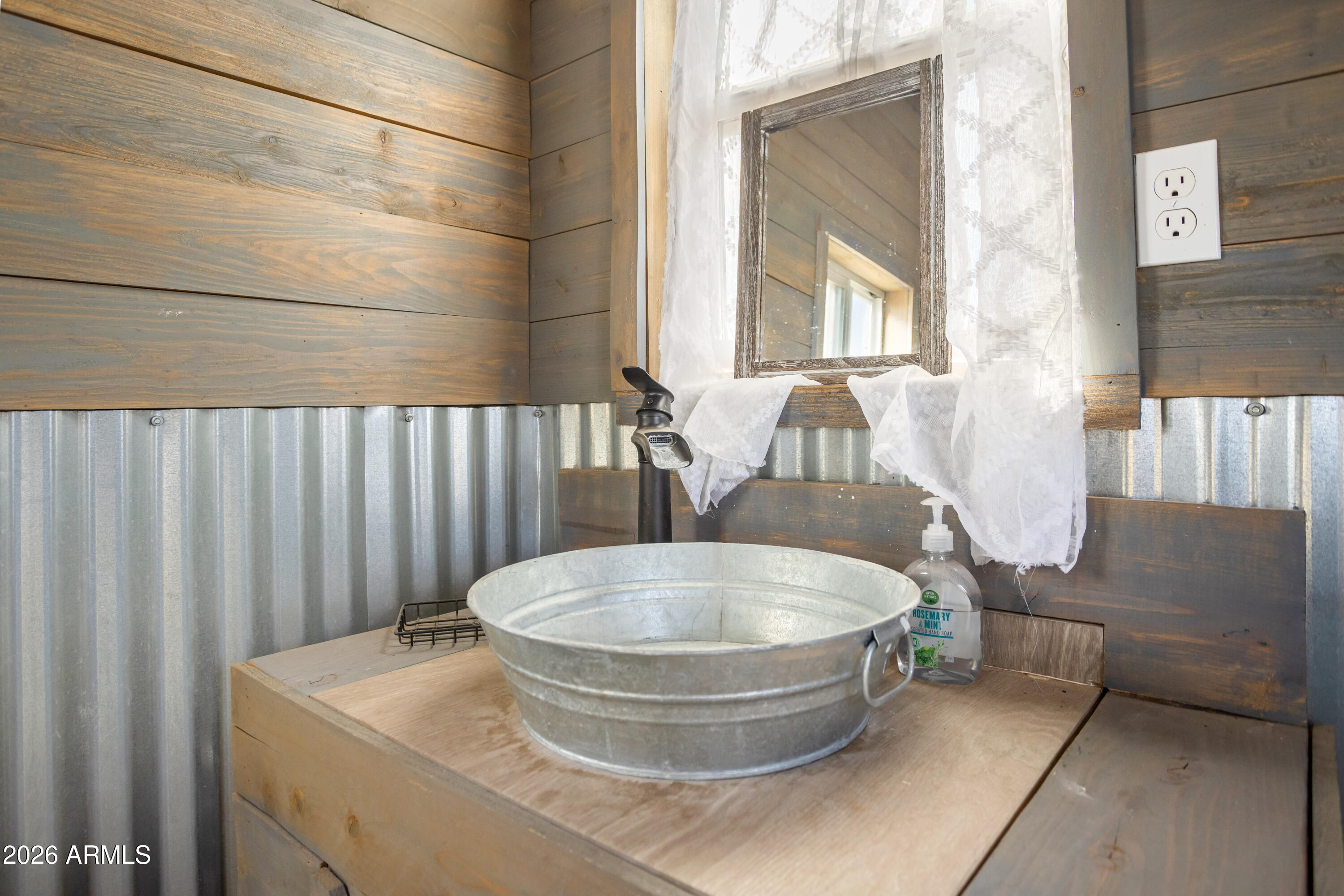 11441 South Samuel Road Hereford, AZ 85615 - Photo 46 of 47 a room with a table and a couch