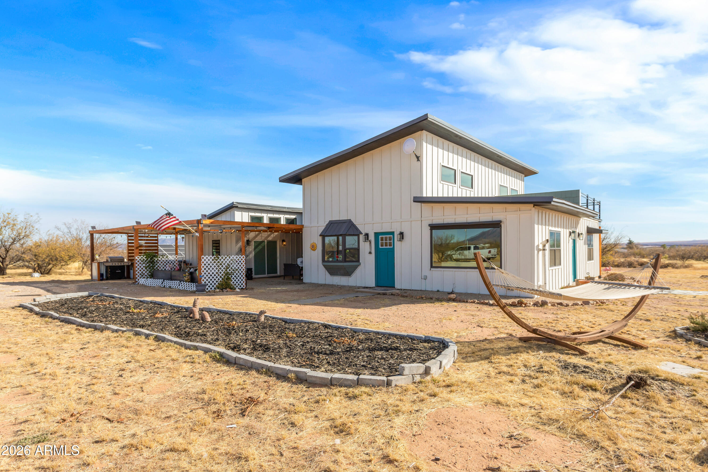 11441 South Samuel Road Hereford, AZ 85615 - Photo 9 of 47 a view of a house with a snow on the road