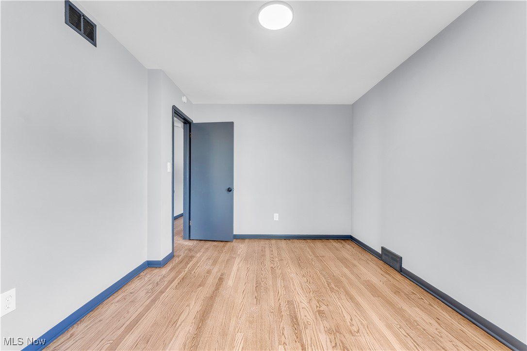 5235 State Road, Unit 3 Cleveland, OH 44134 - Photo 15 of 21 Empty room featuring light wood-type flooring