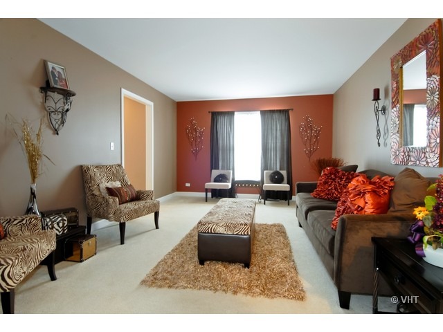 655 Ridge Drive Elburn, IL 60119 - Photo 2 of 16 a living room with furniture and a couch