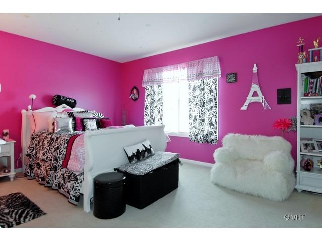 655 Ridge Drive Elburn, IL 60119 - Photo 11 of 16 a bed room with a bed and a couch
