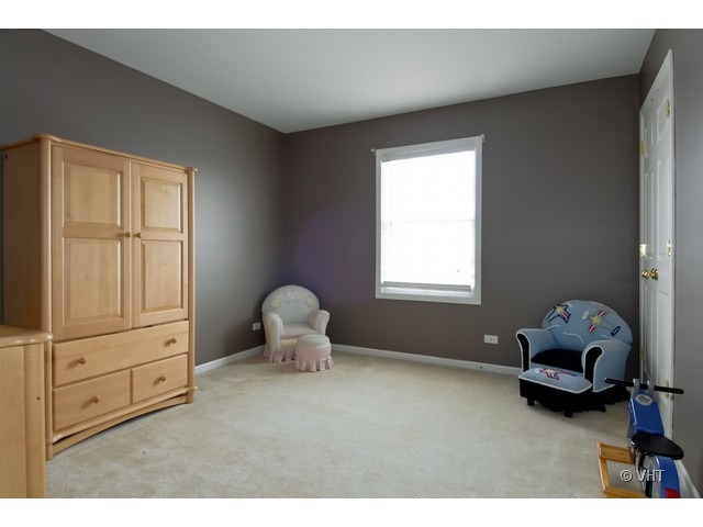 655 Ridge Drive Elburn, IL 60119 - Photo 12 of 16 a living room with furniture