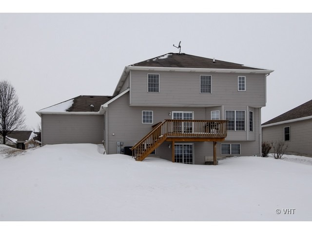 655 Ridge Drive Elburn, IL 60119 - Photo 15 of 16 a front view of a house with a yard
