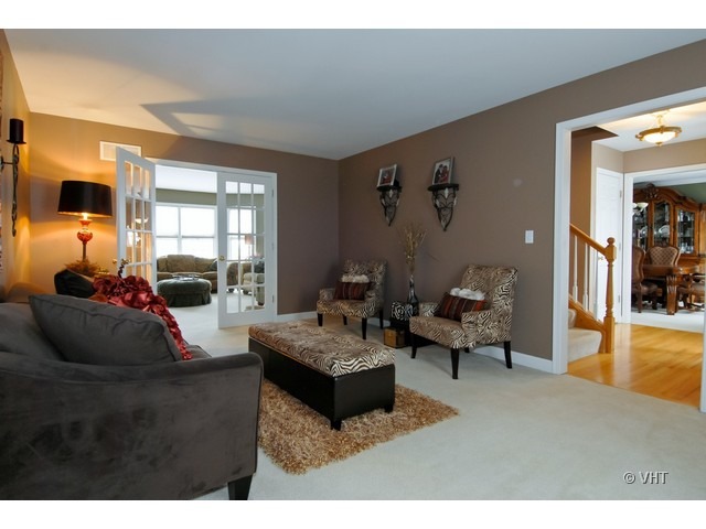655 Ridge Drive Elburn, IL 60119 - Photo 3 of 16 a living room with furniture and a large window