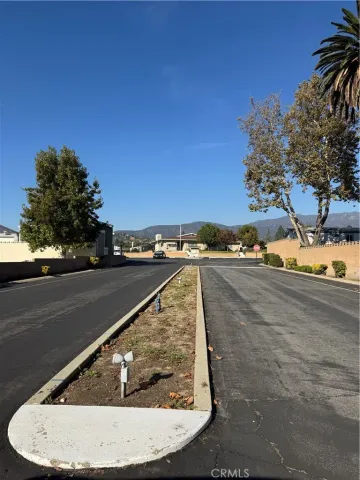 a view of a swimming pool with an outdoor space and seating area