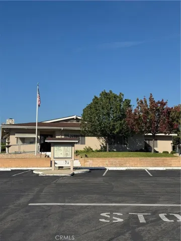 a view of a building and a yard