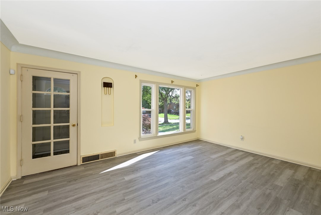 4033 Wyncote Road South Euclid, OH 44121 - Photo 9 of 25 Empty room with hardwood / wood-style floors